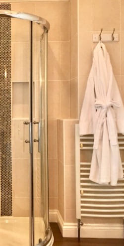 Large en-suite bathroom with walk in shower